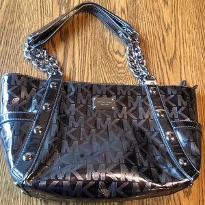 Authentic Michael Kors monogram metallic handbag with chain handles